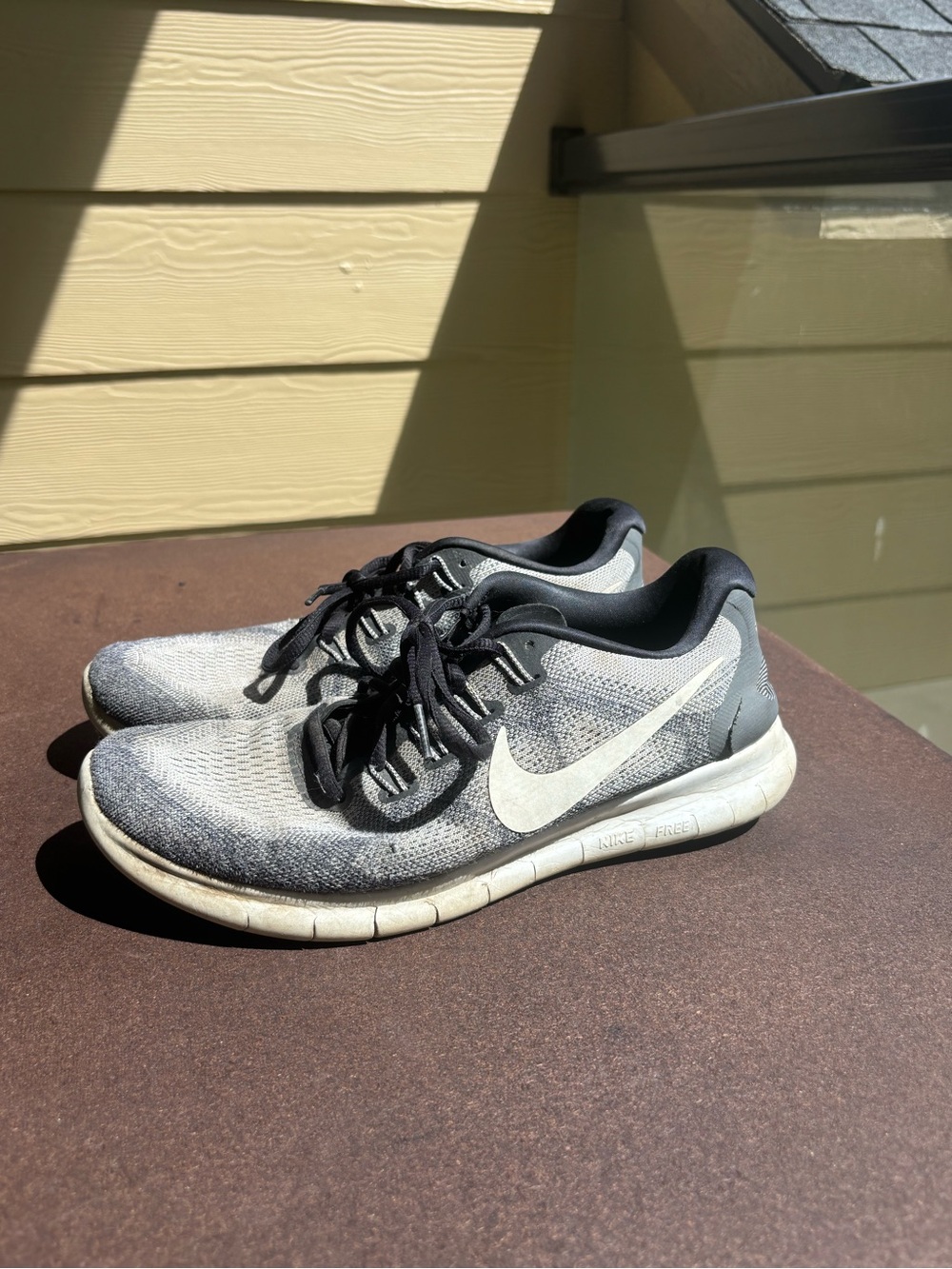 Nike Women’s Gray and Black Knit Running Sneakers